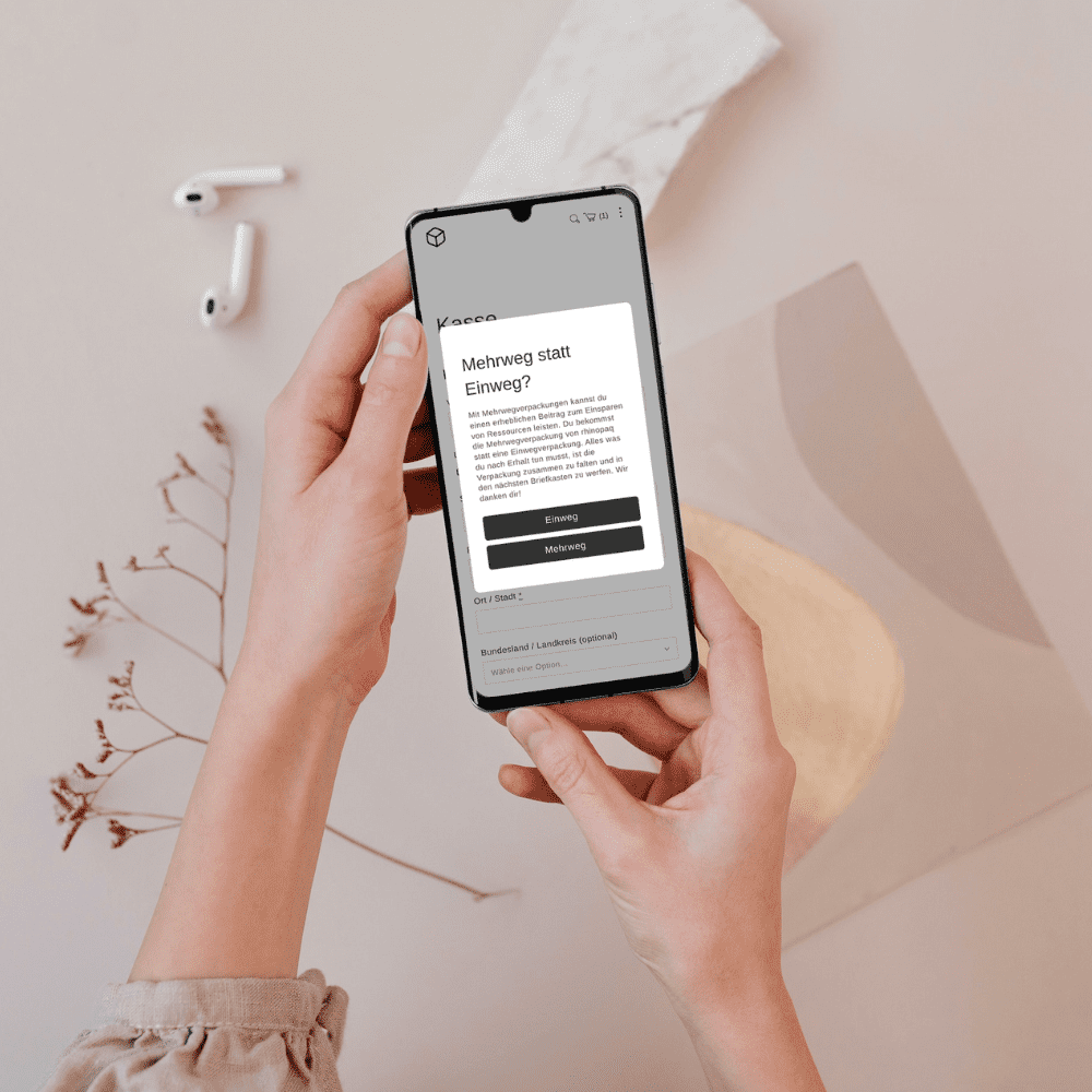 Mehrwegverpackung Abfrage im Checkout des Onlineshops auf einem Smartphone